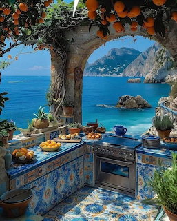 Outdoor kitchen overlooking blue Mediterranean sea with fruit display and coastal cliffs