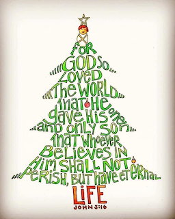 Christmas tree shape made from John 3:16 Bible verse text in green with a star on top