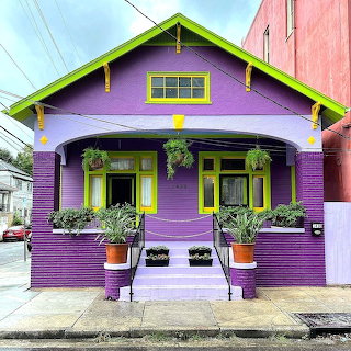 Purple House with Green Trim