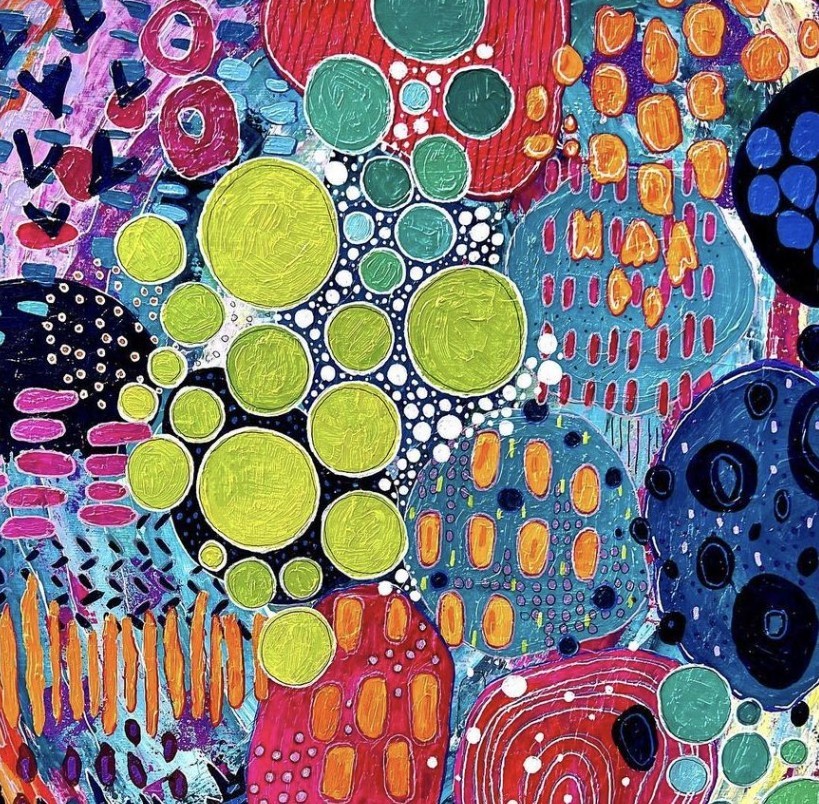 Abstract art with colorful dots and geometric patterns in bright pink, blue, yellow, orange, and teal sections