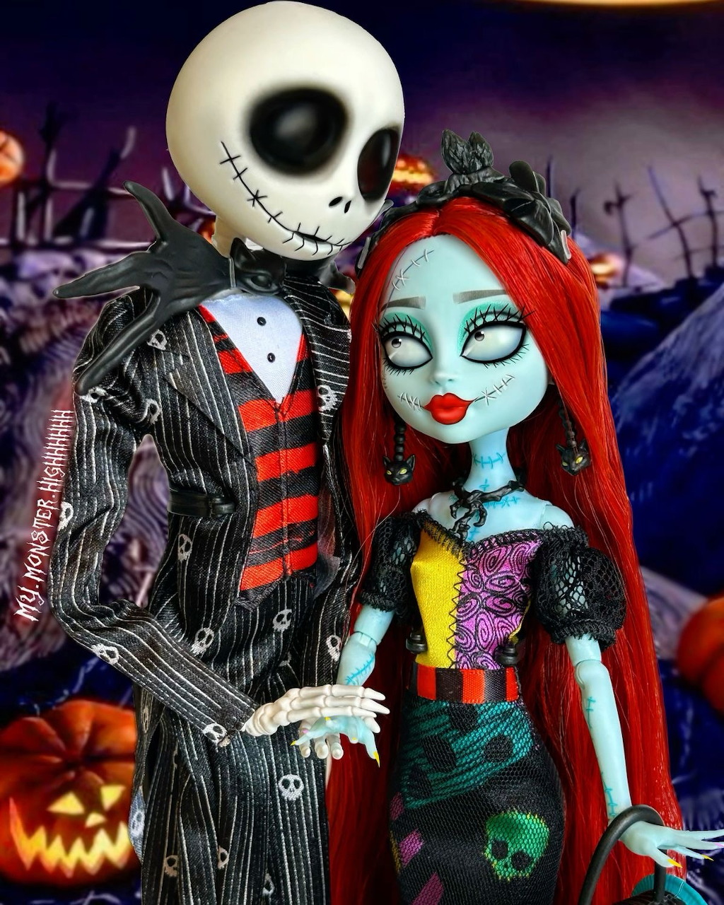 Jack Skellington and Sally dolls standing together against Halloween backdrop with jack-o'-lanterns
