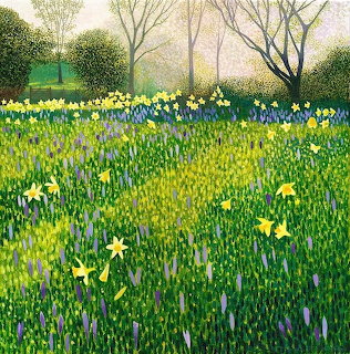 Spring meadow with yellow daffodils and purple crocuses under trees