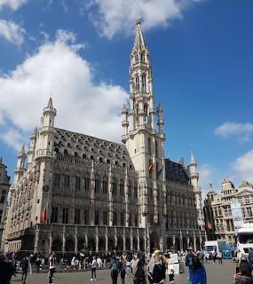 Brussels City Hall Gothic facade with tall spire at Grand Place square, Belgium