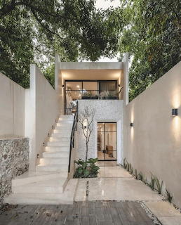Modern house exterior with landscaped yard