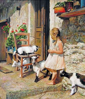 Oil painting of a girl in white dress feeding black and white goats near a stone cottage doorway with flowers