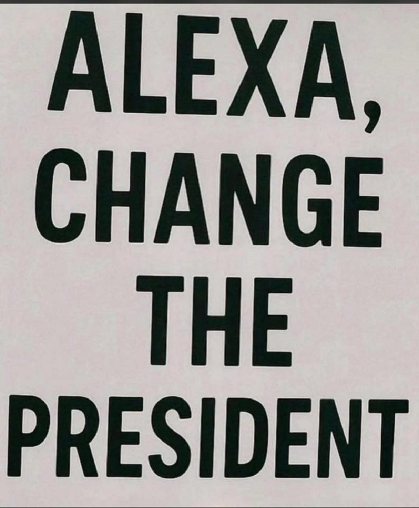 White sign with bold black text saying Alexa, Change The President