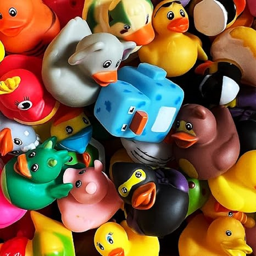 Collection of colorful rubber duck toys in various bright colors and patterns