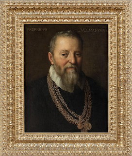 Portrait of bearded man in black with ornate gold chain in decorative gold frame