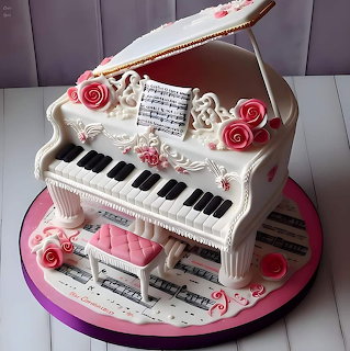 Decorated grand piano cake with roses, keyboard keys, sheet music, and a pink bench