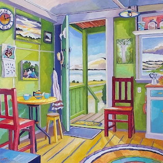Bright painted beach house interior with green walls, open door showing ocean view, red chairs, and yellow striped floor