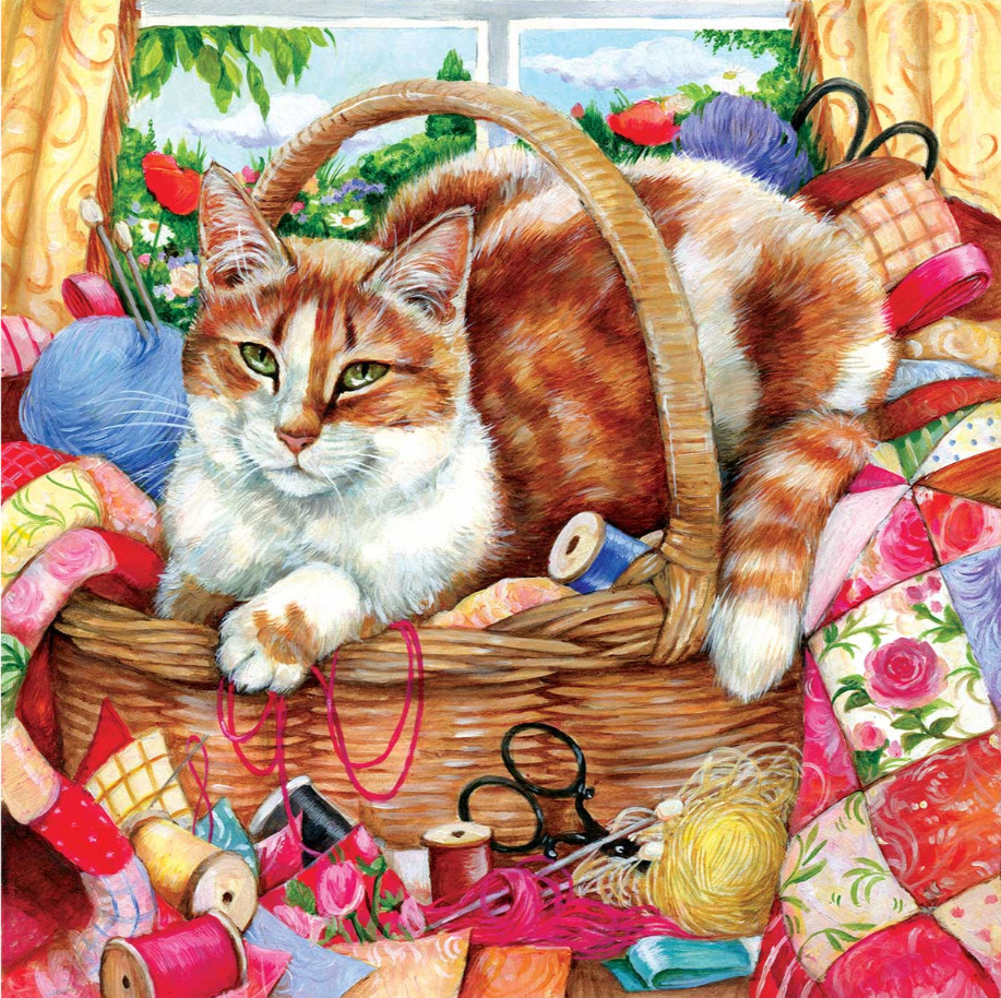 Orange tabby cat lying in wicker basket filled with sewing notions and colorful quilted fabrics