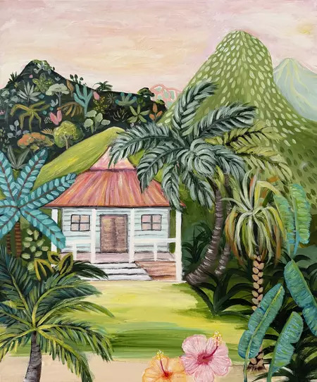 White cottage with red roof surrounded by tropical plants and palm trees with mountains in background