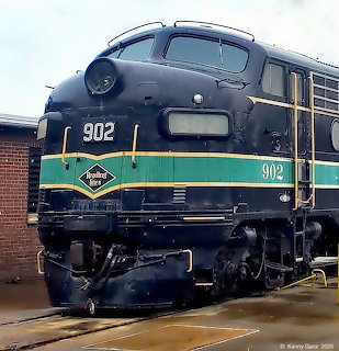 Front view of blue and green Reading Lines diesel locomotive number 902