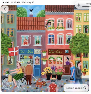 Illustration of colorful buildings with shops, bicycles, flowers, and people on a charming European street