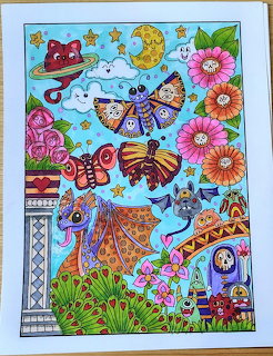 Colorful illustrated cats with ornate patterns, butterflies, flowers and moon on blue background