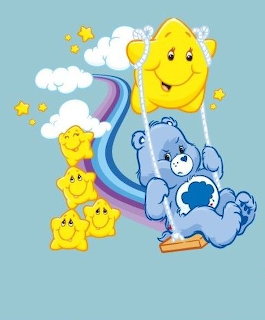Blue Care Bear sitting by a rainbow with smiling moon and stars