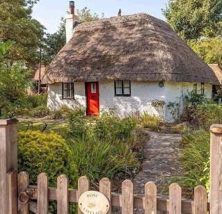Traditional Thatched Roof Cottage