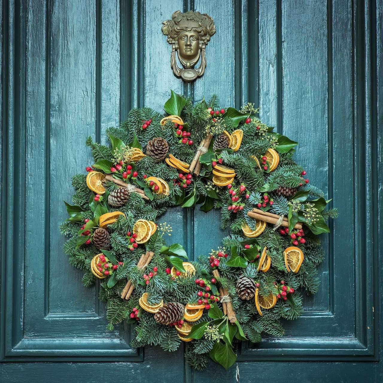 Festive Christmas Wreath on Teal Door