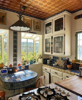 Cozy traditional kitchen interior with wooden cabinets and warm lighting