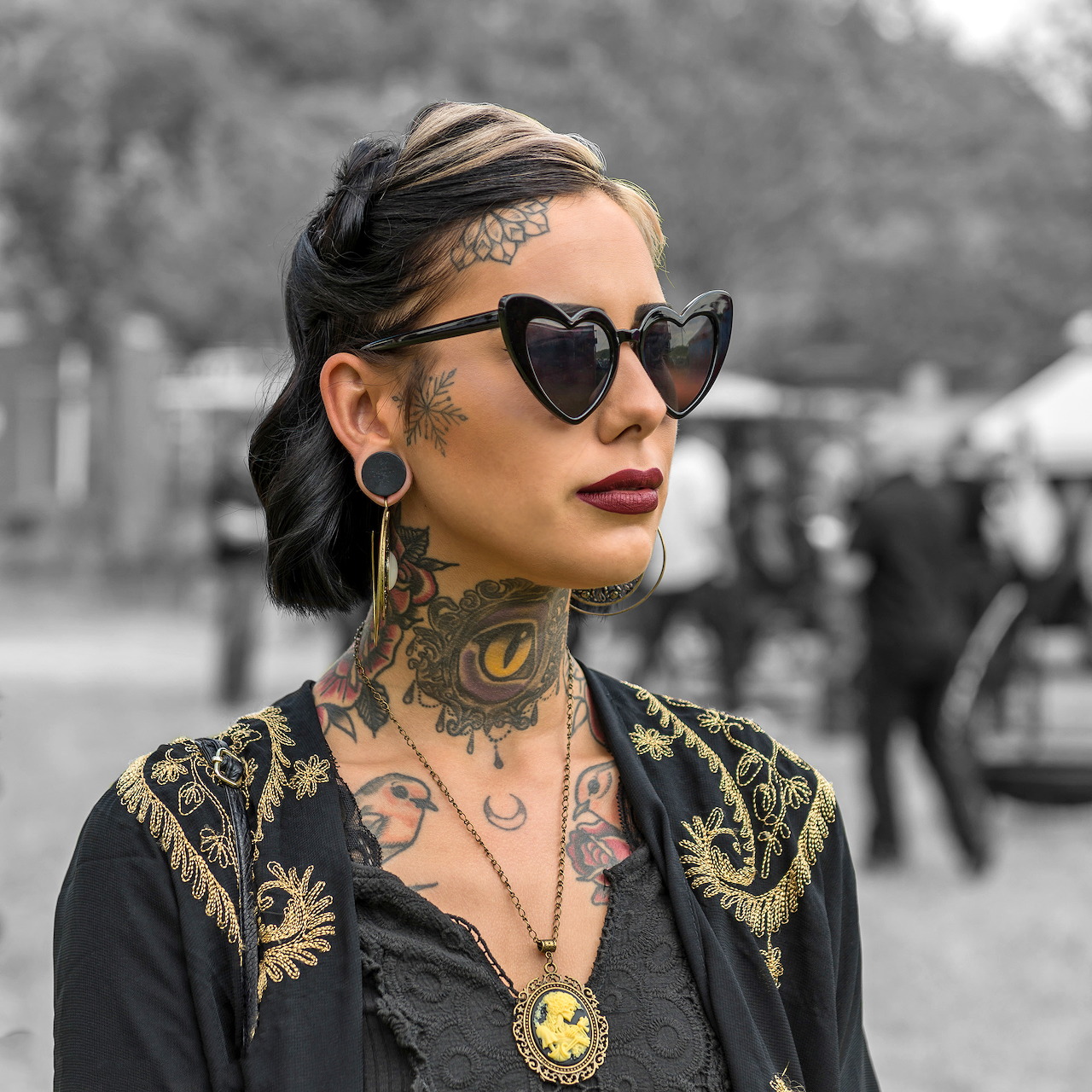 Tattooed Woman with Sunglasses