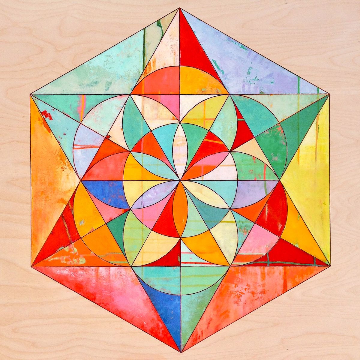 Colorful geometric mandala with hexagonal symmetry and triangular watercolor segments