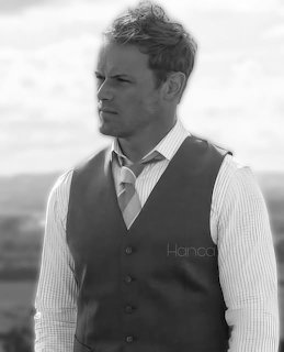 Black and white portrait of man in vest and striped shirt looking away outdoors