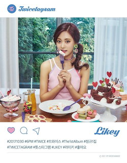 Tzuyu from TWICE sitting at a dessert table wearing a pink dress, Likey concept photo