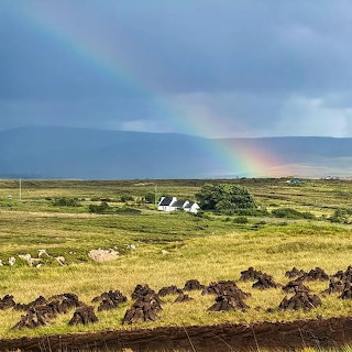 Rainbow Over Cottage