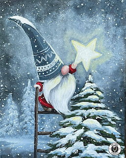 Painted gnome with long white beard and decorative hat sitting on ladder, holding glowing star beside snow-covered tree