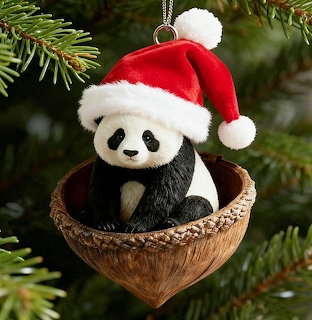 Panda wearing Santa hat in acorn ornament on Christmas tree