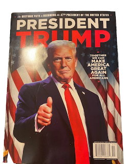 Magazine cover with Donald Trump giving a thumbs up in front of American flags