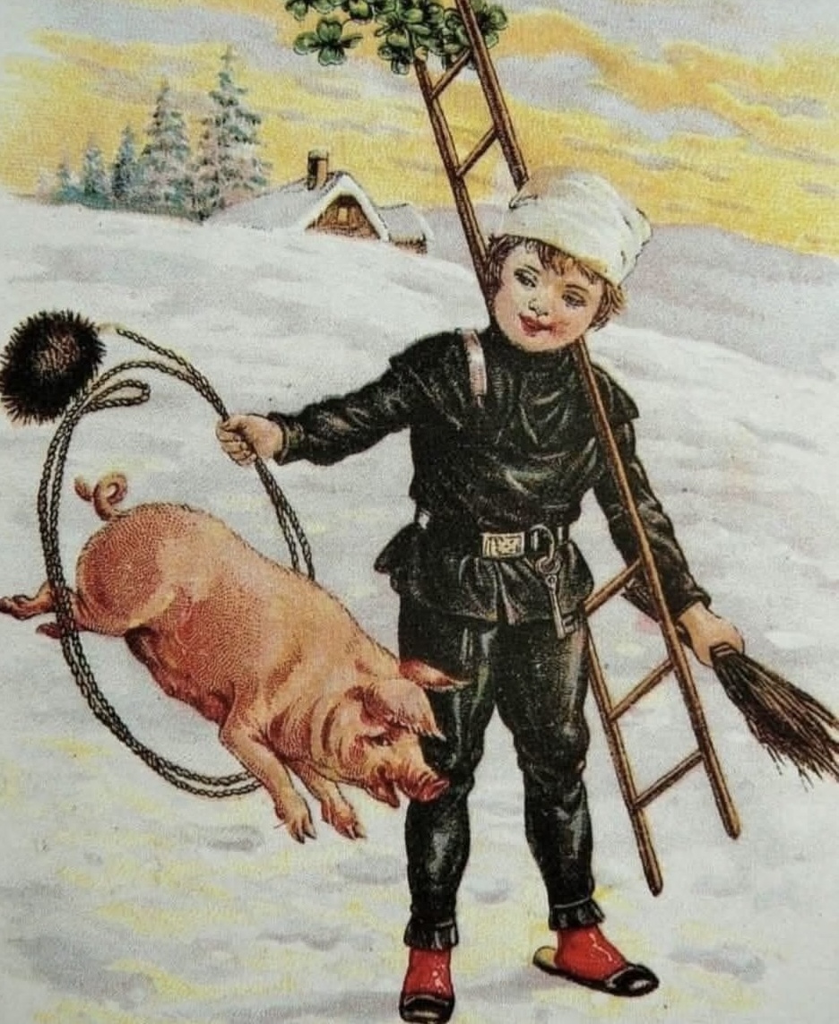 Vintage postcard: child chimney sweep with pig on sled in snow