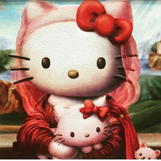 Hello Kitty wearing red checkered hood holding small white plush toy