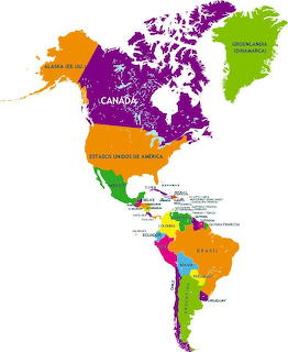 Map of the Americas with North, Central and South America in green on blue ocean.