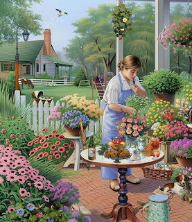 Woman tending flower arrangements at garden shop porch with cottage and colorful blooms