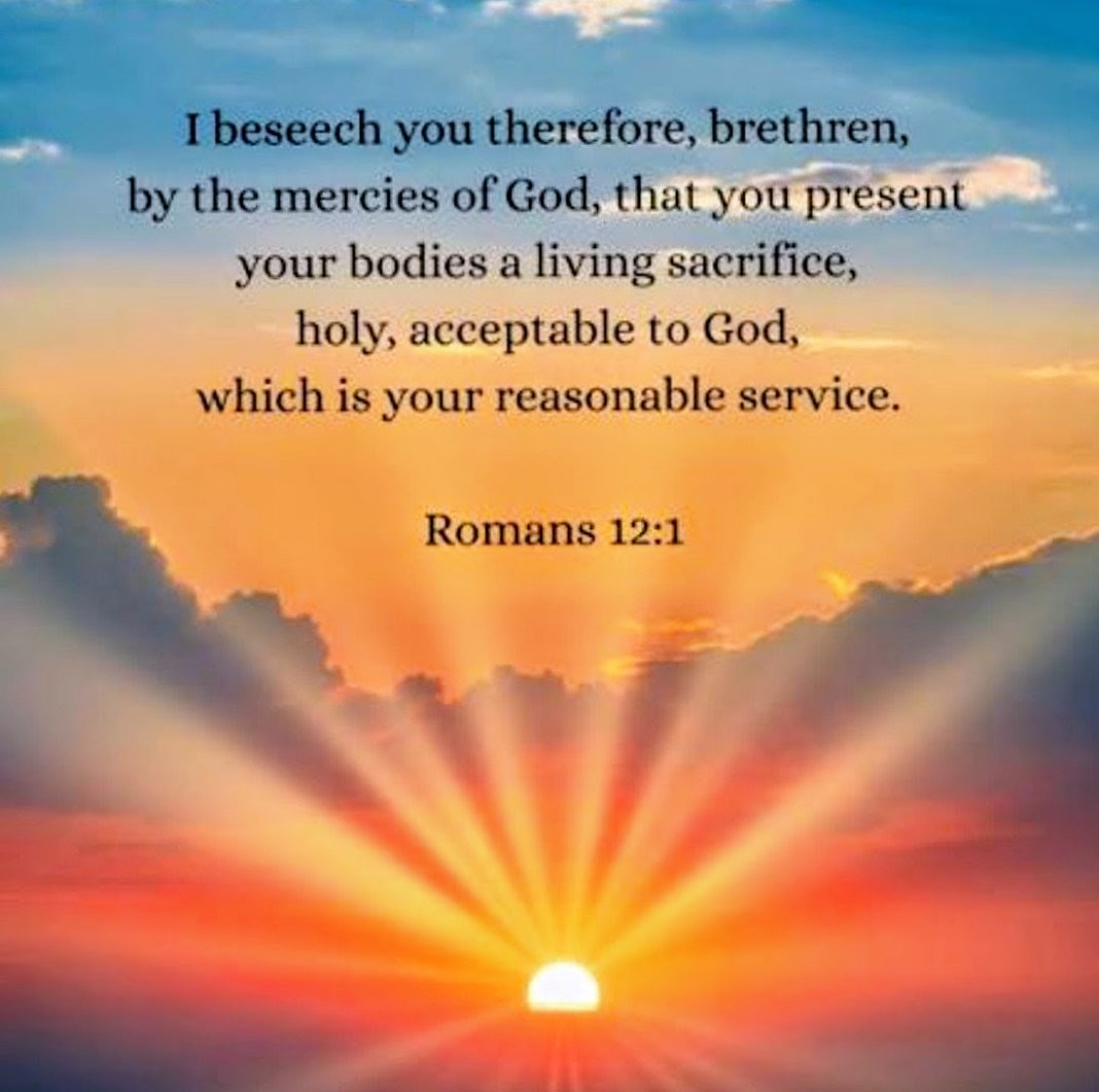 Romans 12:1 Bible verse text on colorful sunrise with sun rays breaking through clouds