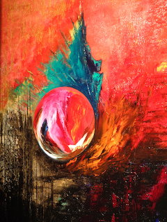 Abstract painting with orange and red background, turquoise accent, and central pink spherical form with dark dripping effects