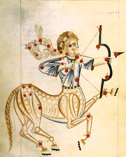 Medieval manuscript painting of Sagittarius centaur holding bow and arrow on aged parchment