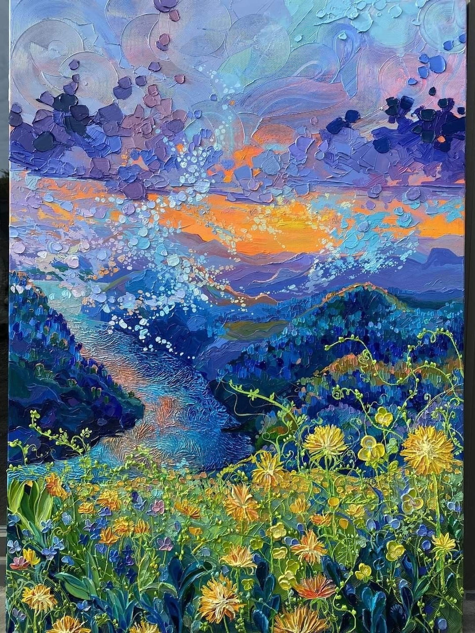 Colorful impressionist painting showing mountain landscape at sunset with dramatic sky and wildflowers