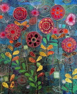 Colorful folk art textile illustration of stylized round flowers with intricate patterns on dark background
