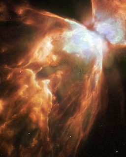 NGC 6302 Butterfly Nebula with orange and blue glowing gas clouds and dark dust lanes in space