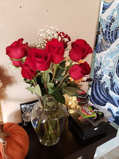 Red Roses in Glass Vase