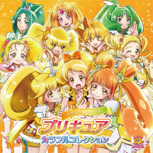 Colorful Pretty Cure anime characters grouped together in bright yellow and orange costumes