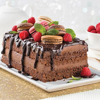 Chocolate Cake with Macarons and Raspberries