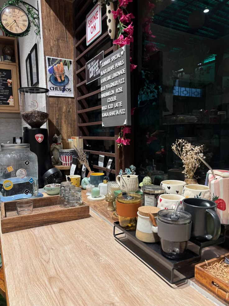 Cozy cafe counter with espresso machine, mugs, dried flowers and wooden bar