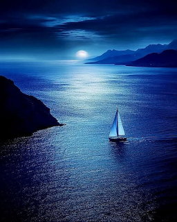 Sailboat at Moonlit Sea