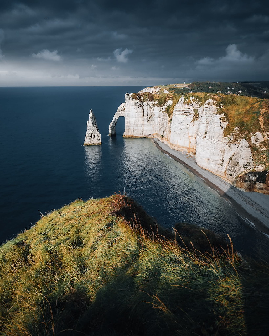 Coastal cliffs along the French shoreline with ocean waves