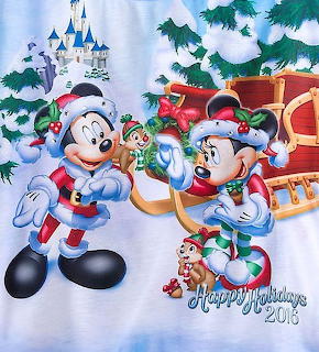 Mickey and Minnie Mouse in Santa costumes with a sleigh and castle in a Christmas scene