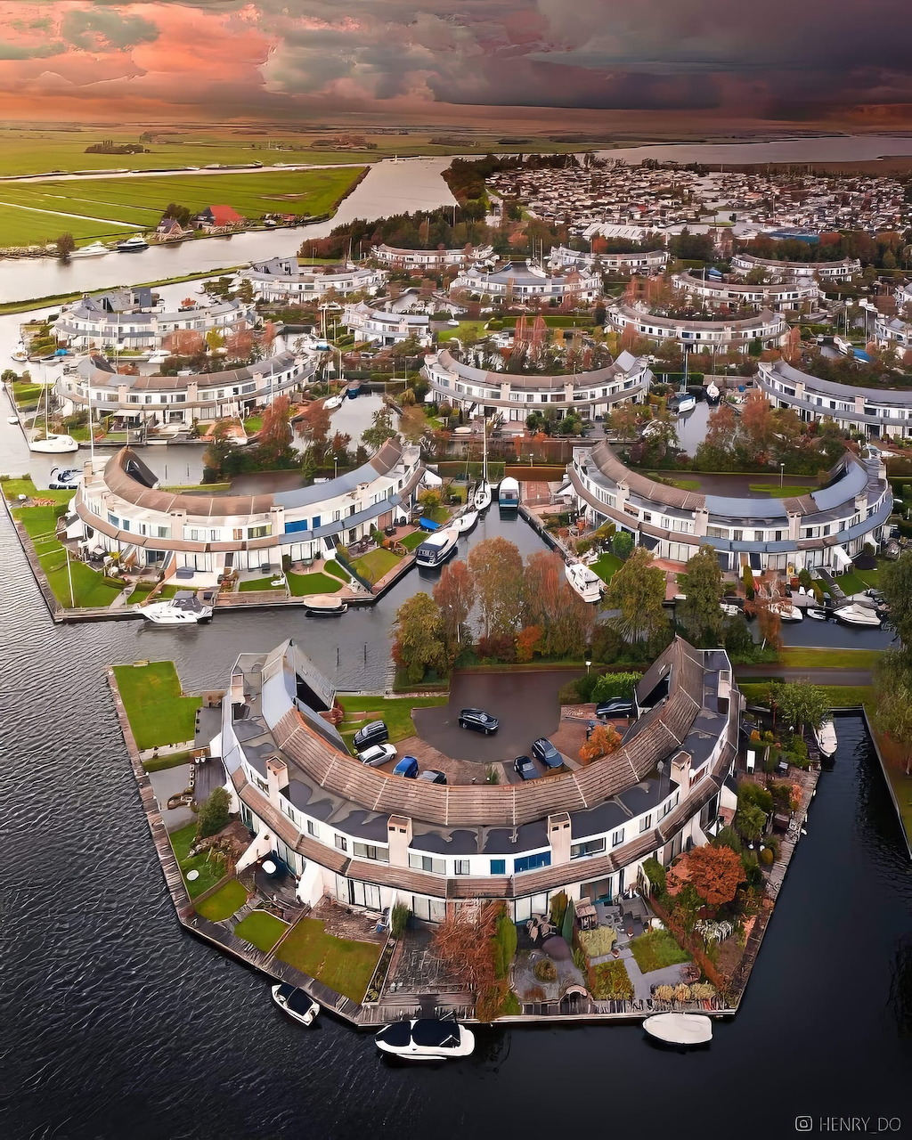 Row of Dutch canal houses along a waterway in the Netherlands