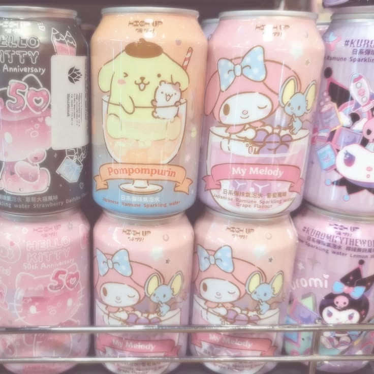 Stacked pastel beverage cans with cute cartoon character designs on a shelf